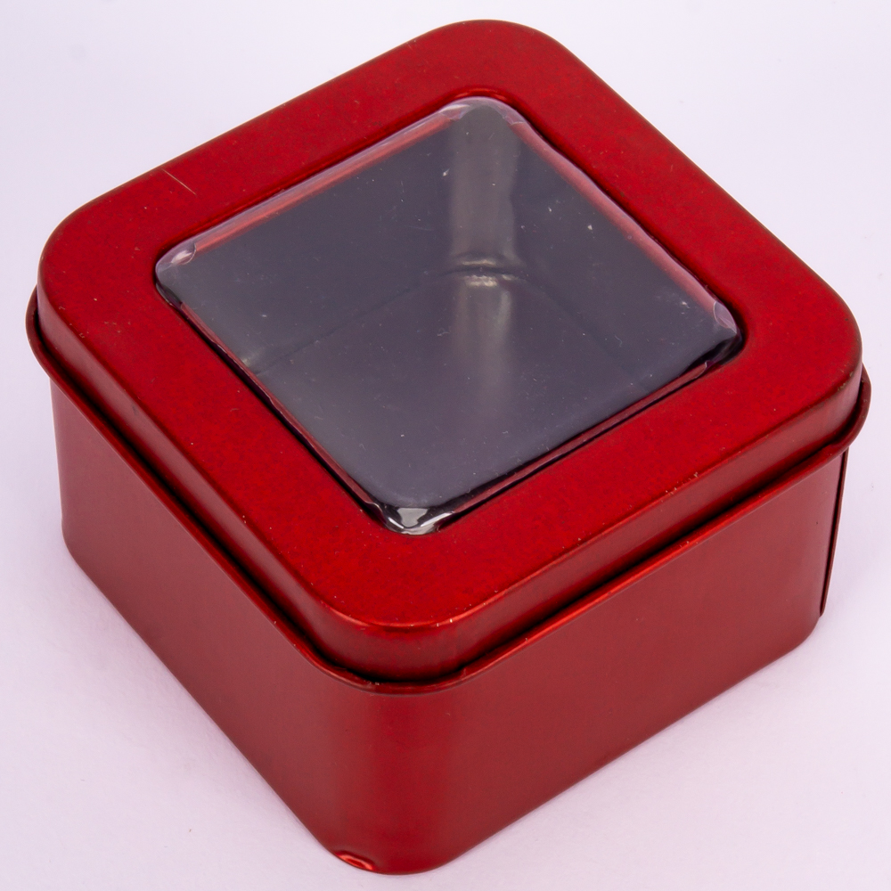 Caja metálica lisa cuadrada con detalle transparente 6.5x4cm surtido